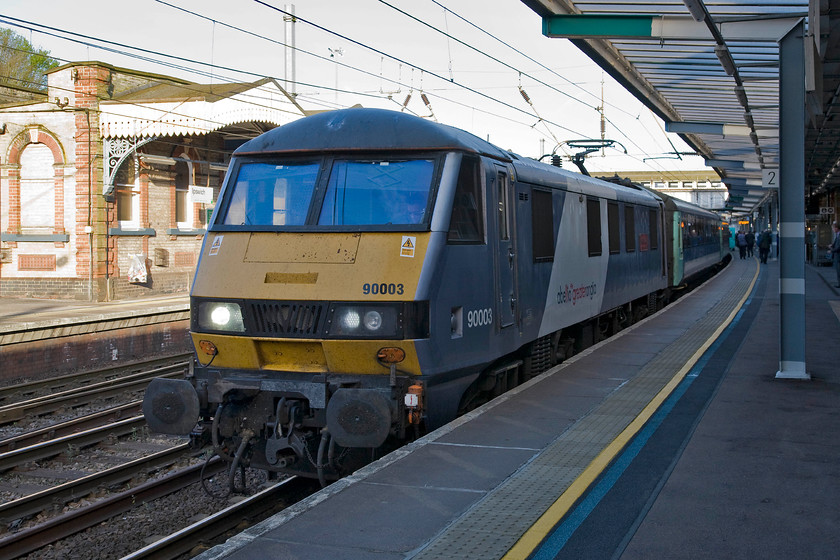 90003, LE 06.48 Norwich-London Liverpool Street (1P11), Ipswich station 
 Missing the early morning sunshine at Ipswich station 90003 'Raedwald of East Anglia' pauses with the 06.48 Norwich to Liverpool Street service. I think that the Abellio Greater Anglia livery suits the Class 90s so it seems a shame that the company has not afforded the same treatment to their stock. 
 Keywords: 90003 06.48 Norwich-London Liverpool Street 1P11 Ipswich station Great Anglia Raedwald of East Anglia