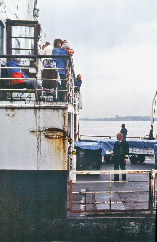 MV Farringford, 15.15 New Holland Pier-Hull Corporation Pier, New Holland Pier 
 Having tied off MV Farringford moves away from Hull Corporation Pier working the 15.15 sailing to Hull (seen in the background on the other side of the Humber estuary). Passengers aboard seem to be taking an interest in me taking my photographs but with less than a week to go in operation before withdrawal due to the opening of the Humber bridge, I am glad that I took so many! 
 Keywords: MV Farringford 15.15 New Holland Pier-Hull Corporation Pier, New Holland Pier