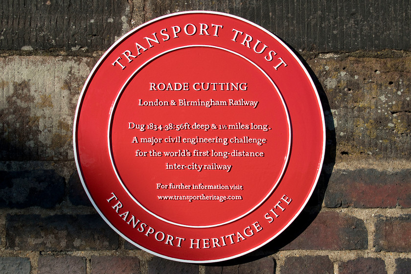 Commemorative plaque, Hyde Road bridge, Roade 
 This commemorative plaque was unveiled in October 2018 on Hyde Road bridge in the village of Roade directly above the famous cutting. As can be seen, it was unveiled to mark the 180th anniversary of the opening of the cutting through which the WCML travels 57 miles north of London. 
 Keywords: Commemorative plaque Hyde Road bridge Roade