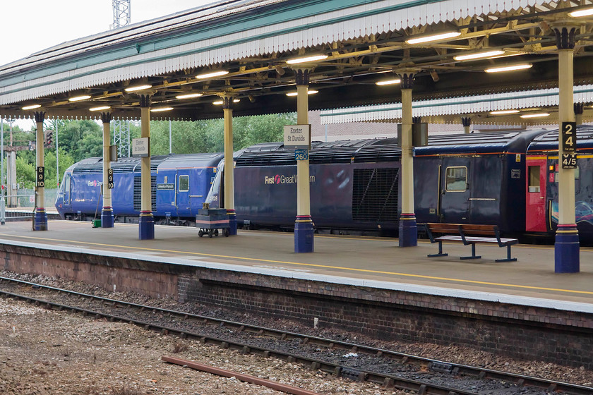 43149, GW 17.33 London Paddington-Paignton (1C91, 3E) & 43128, GW 18.03 London Paddington-Penzance (1C92, 4L), Exeter St. David's station 
 HSTs side by side at Exeter St. David's station. To the left is 43149 'University of Plymouth' leading the 1C91 17.33 Paddington to Paignton. Under the canopy is 43128 leading the 1C92 18.03 Paddington to Penzance. These trains will leave within minutes of each other and travel close behind one another as far as Aller Junction where the Penzance working will continue off heading westwards. 
 Keywords: 43149 1C91 43128 1C92 Exeter St. Davids station