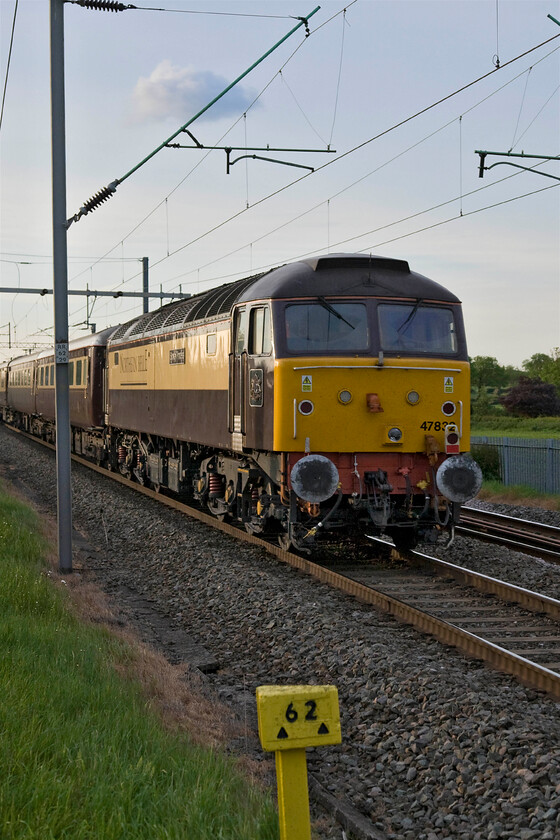 47832, return leg of The Northern Belle 18.37 Kensington Olympia-Manchester Victoria (1Z59), Milton Malsor SP740553 
 A bit of 'grab shot' at Milton Malsor near Northampton shows Northern Belle liveried 47832 'Solway Princess'. The veteran Class 47, that entered service almost exactly fifty years ago in the summer of 1964 as D1610, is seen at the rear of the returning Northern Belle charter from London (Kensington Olympia) to Manchester running as 1Z59. 
 Keywords: 47832 The Northern Belle 18.37 Kensington Olympia-Manchester Victoria 1Z59 Milton Malsor SP740553 Solway Princess Northern Belle