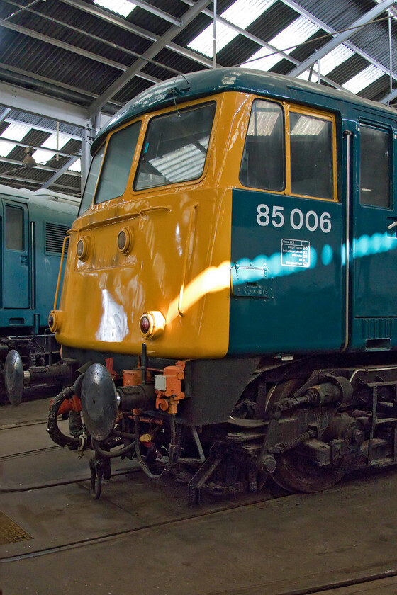 85006, on display, Barrow Hill Roundhouse 
 The AC Locomotive Group have been a feature of the Barrow Hill depot and roundhouse since its early years of operation and remains a fixed feature. They are the custodians of a number of AC electrics from the various classes with some kept at Barrow Hill undergoing restoration. Among them is 85006 looking very smart in its BR blue, despite it being applied way back in 2013 by Boden Rail at Washwood Heath. The locomotive has been electrically restored and tested but the roarer is unlikely to see action on the mainline again. 
 Keywords: 85006 on display Barrow Hill Roundhouse AC electric