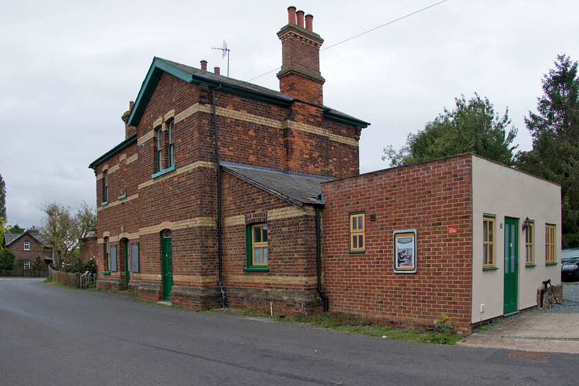 Former Cowbit station (Closed, 11.09.61) 
 The former station building in the village of Cowbit is seen complete with a rather unattractive side extension. The main building is of a typical Great Eastern design that the present owner has maintained complete with period signs and posters. Along with all other stations on the former GN & GE Joint line between March and Spalding (with the exception of Murrow West) it was shut on 11.09.61. 
 Keywords: Former Cowbit station Closed