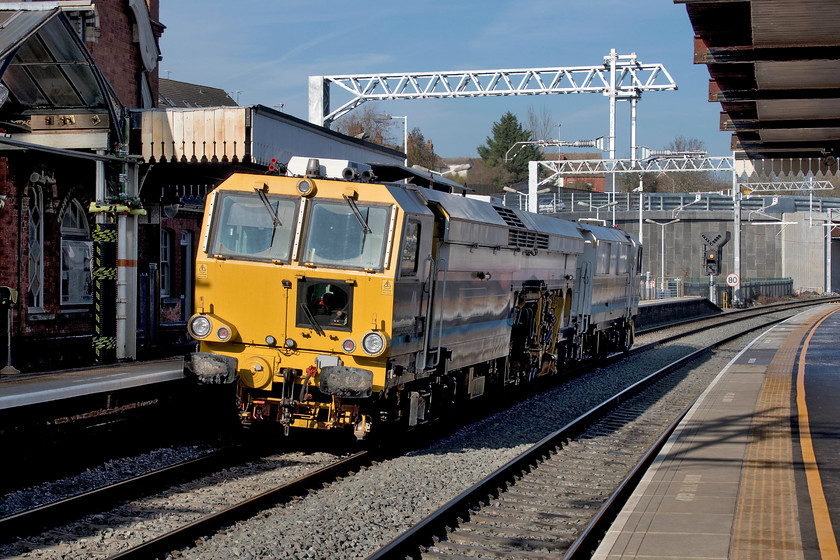 DR75405, unidentified track working, Wellingborough station 
 Unfortunately, I have been unable to identify this particular working as there was nothing showing on RTT. DR75405 has an amber and the feather meaning that it is being sent into a loop just north of Mill Road bridge at Wellingborough. Mill Road bridge is out of site behind the recently opened Driver Way bridge that leads to a huge new housing development, named Stanton Cross, to the east of the town. 
 Keywords: DR75405 unidentified track working Wellingborough station