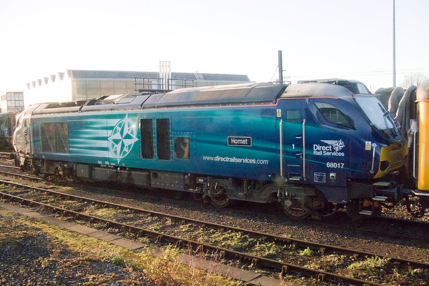 68017, stabled, RVEL Derby 
 68017 'Hornet' stands in Derby 's RVEL sidings. Built by Vossloh in Spain for Direct Rail Services it was introduced in 2014 undertaking a variety of work. It is attached to one of Network Rail's test trains 
 Keywords: 68017 RVEL Derby