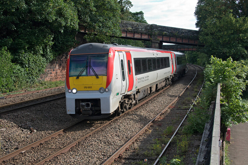 175003, AW 16.45 Llandudno-Manchester Airport (1H92, RT), Raymond Street 
 The Transport for Wales livery applied to the Class 175 units as part of their refurbishment programme between 2019 and 2022 looks very smart and will be the last that they will carry possibly prior to their withdrawal unless a new operator is to take them on. 175003 (previously named 'Eisteddfod Genedlaethol Cymru') working the 1H92 16.45 Llandudno to Manchester Airport is seen approaching Chester taken from Raymond Street which is a classic location for many a railway photographer over the years! 
 Keywords: 175003 16.45 Llandudno-Manchester Airport 1H92 Raymond Street Transport for Wales