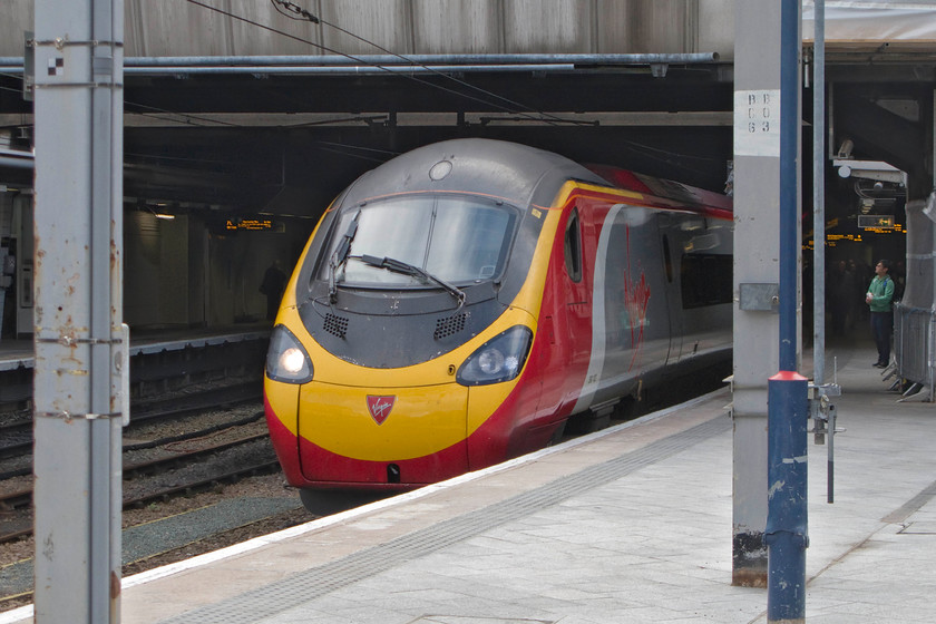 390132, VT 08.42 Coventry (07.43 Euston, cancelled because of fatality at Leighton Buzzard) Glasgow Central (9S47), Birmingham New Street station 
 My train north from Birmingham to Carlisle arrives at New Street in the form of its eponym 390132 'City of Birmingham'. This was supposed to have been the 9S47 07.43 service from Euston. However, due to a fatality on the line at Leighton Buzzard, the service originated from Coventry as the 08.43 departure. I had a very fuss-free journey to the border city courtesy of Mr. Branson. 
 Keywords: 390132 08.42 Coventry 07.43 Euston Glasgow Central 9S47 Birmingham New Street station Virgin Pendolino