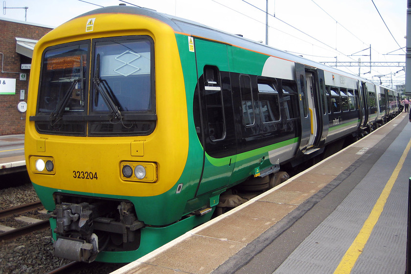 323204, LM 13.31 Walsall-Wolverhampton (2W32), Sandwell & Dudley station 
 323204 pauses at Sandwell and Dudley station with the 13.31 Walsall to Wolverhampton cross-Birmingham service. My boss and I had just travelled on this train from Birmingham New Street. 
 Keywords: 323204 13.31 Walsall-Wolverhampton 2W32 Sandwell & Dudley station