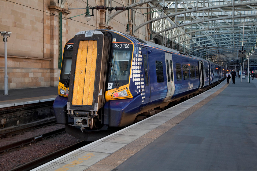 380106, SR 19.30 Glasgow Central-Ayr (1K57, RT), Glasgow Central station 
 380106 waits at platform 14 at Glasgow Central station. This was our final train of the day, the 19.30 to Ayr that we took all the way its destination. Despite travelling over what was going to fairly new track, the ride on this relatively new class 380 was not very impressive. However, the acceleration and general ambiance was pretty good and the free wifi worked! 
 Keywords: 380106 1K57 Glasgow Central station