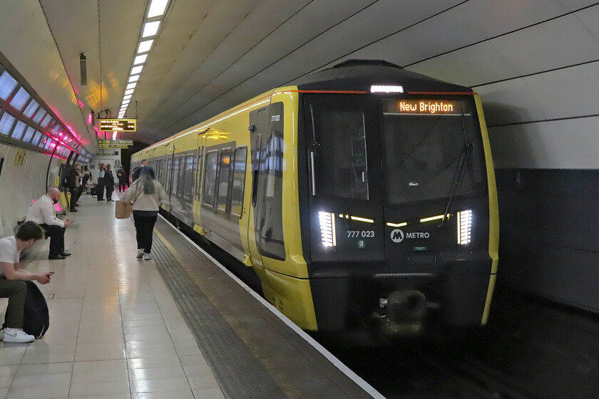 777023, ME 12.08 New Brighton-New Brighton (2N24, RT), Hamilton Square station 
 After alighting at Hamilton Square our train from Chester Andy and I changed platforms to get the 12.08 New Brighton circular service to its destination. 777023 is seen arriving at Hamilton Square working the Merseyrail 2N24 service. 
 Keywords: 777023 12.08 New Brighton-New Brighton 2N24 Hamilton Square station Merseyrail