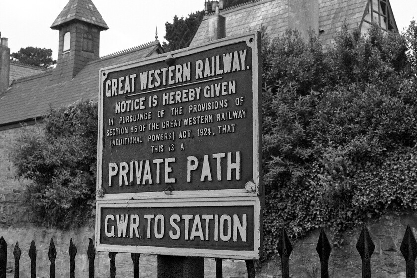 Ex GWR cast & wrought iron spear fencing, St. Austell station 
 A couple of relics from GWR days adjacent to the recently closed St. Austell signal box. As well as the superb cast sign with its archaic wording notice the wrought iron spearhead fencing. This design was the equivalent of our modern-day palisade I suppose and I know what I would rather see! 
 Keywords: Ex GWR cast & wrought iron spear fencing St. Austell station