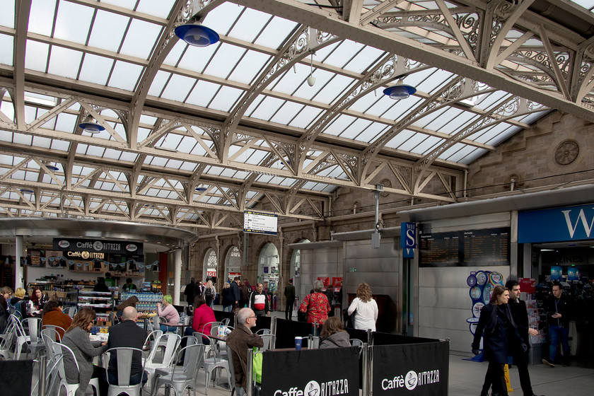 Concourse, Sheffield station 
 The beautifully restored roof of Sheffield (Midland) station. I often criticise the work done on the railways, but the renovation of Sheffield station and its environs has created a really pleasant space that seems to be appreciated by the travelling public if the numbers enjoying its facilities are anything to go by. It is also good that East Midlands Trains have listened to people and have kept the station 'open' with no ghastly barriers installed and that the link bridge is being kept open. 
 Keywords: Concourse Sheffield station