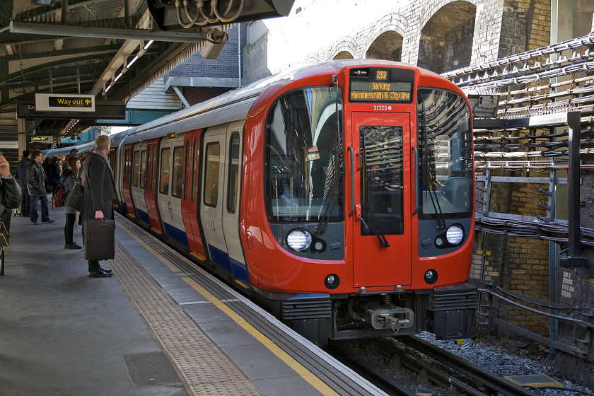 21325, a Hammersmith & City Line working to Barking (Edgware Road-Baker Street), Edgware Road TfL station 
 An S7 unit arrives into the sunlight at Edgware Road TfL station with a Hammersmith and City Line service to Barking. I took this unit, lead by car 21325, only as far as Baker Street where I changed for a Bakerloo Line train to Oxford Circus in order to meet my wife and son for a late lunch in John Lewis'. 
 Keywords: 21325 Hammersmith & City Line working to Barking Edgware Road-Baker Street Edgware Road TfL station