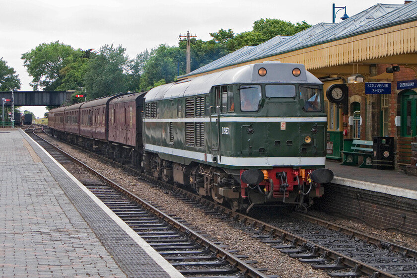 D5631, 17.30 Holt-Sheringham, Sheringham station 
 The final service train of the day on the North Norfolk Railway arrives at Sheringham having left Holt at 17.30. It is led by resident former Class 31 D5631 that looks superb. It is indicative of how dull this July evening was witnessed by the glow of the twin marker lights that are, of course not authentic on a locomotive wearing this livery. 
 Keywords: D5631 17.30 Holt-Sheringham Sheringham station NNR North Norfolk Railway