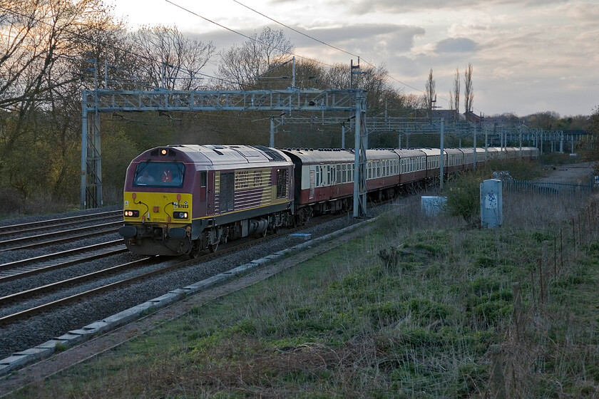 67023, return leg of The Welshpool & Llanfair Railway & Historic Shrewsbury, 17.13 Shrewsbury-Letchworth (1Z09), Roade 
 The return leg of The Welshpool & Llanfair Railway & Historic Shrewsbury charter passes Roade led, as it was this morning, by 67023. This charter ran to almost perfect time both on its outward and return legs, it is actually seven months late! It should have run on 29.09.12 but was cancelled due to the ASLEF/DBS industrial dispute. I hope that those who booked to travel on the original date were able to enjoy the charter today. 
 Keywords: 67023 The Welshpool & Llanfair Railway & Historic Shrewsbury 17.13 Shrewsbury-Letchworth 1Z09 Roade EWS