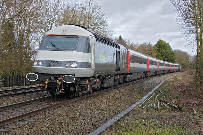 43480 & 43468, outward leg of The Master Cutler, 06.48 Sheffield-London Marylebone (1Z43, 8E), Claydon crossing SP451498 
 By now running nearly thirty minutes late, the 06.48 Sheffield to Marylebone Master Cutler Retro Railtours' charter is seen passing Claydon between Banbury and Leamington Spa. The stock is composed of a short rake of former East Midlands coaches giving the passengers a sumptuous ride on some well-sprung and large seats in contrast to today's modern-day versions. Meanwhile, the power is supplied by two of RailAdventure's HST power cars with 43480 leading and 43478 on the rear. Despite the late running here on arrival at Marylebone the train was only eight minutes adrift. Passengers could either alight in London for several hours or complete a short out-and-back run to Banbury 
 Keywords: 43480 43468, outward leg of The Master Cutler 06.48 Sheffield-London Marylebone 1Z43 Claydon crossing SP451498