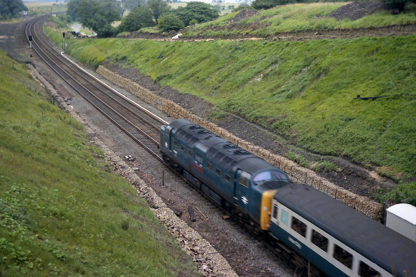 55005, 10.55 London Kings Cross-Edingburgh (1S21), High Dyke SK942289 
 Standing above the north portal of Stoke Tunnel give a clear view of the recent engineering work that has been undertaken. It also shows the simplified track layout of the ECML as it passes High Dyke. 55005 'The Prince of Wales' Own Regiment of Yorkshire' has just burst out of the 880 yard long Stoke Tunnel with the 1S21 10.55 King's Cross to Edinburgh. 
 Keywords: 55005 10.55 London Kings Cross-Edingburgh 1S21 High Dyke SK942289