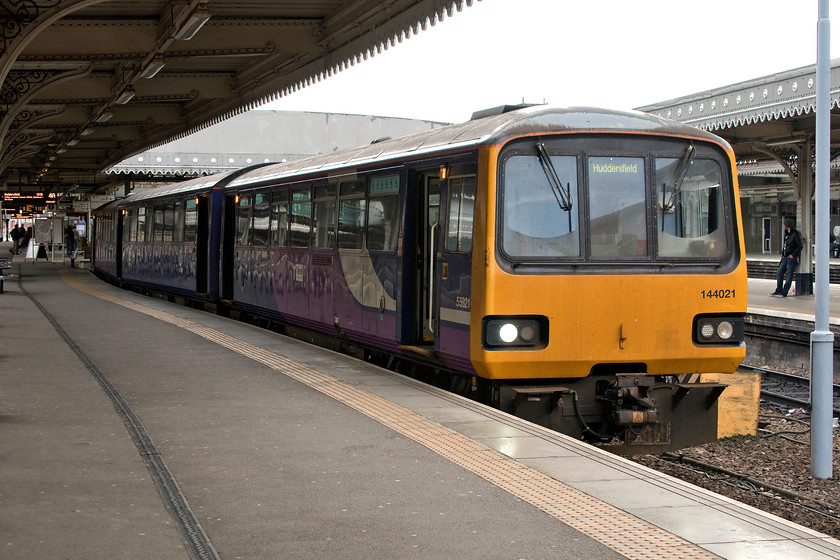 144021, NT 15.35 Sheffield-Huddersfield (2B60, 2E), Sheffield station 
 144021 waits to leave Sheffield working the 15.35 to Huddersfield. This train will follow the winding route via Penistone, a line that Andy and I surveyed in a visit at the start of the year...... https://www.ontheupfast.com/v/photos/21936chg/C321165604/x2-pennine-explorer-ii-03-01-19 
 Keywords: 144021 15.35 Sheffield-Huddersfield 2B60 Sheffield station