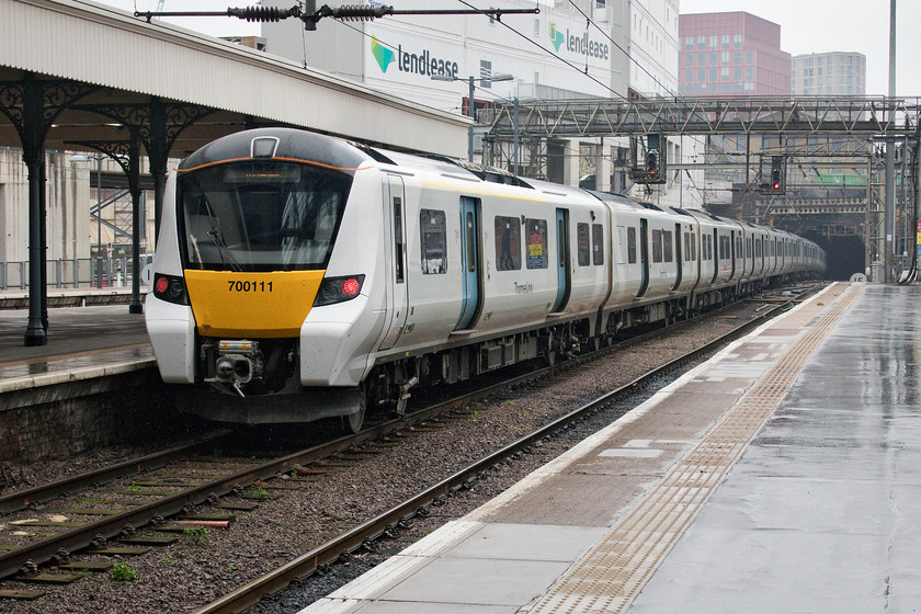 700111, GN 15.12 London King`s Cross-Peterborough (1P42, RT), London King`s Cross station 
 With the take-over of the Great Northern local services complete 700111 arrives at King's Cross with the 15.12 from Peterborough. The incessant changing scene at King's Cross continues with the building on the site of the former famed diesel depot nearing completion. In addition, the extensive re-modelling of King's Cross' lines with the reinstatement of the redundant third tunnel is due to start next year in 2020. 
 Keywords: 700111 15.12 London King`s Cross-Peterborough 1P42, RT London King`s Cross station