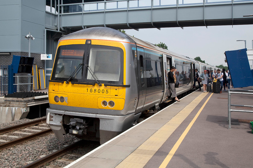 168005, CH 12.06 London Marylebone-Oxford (1T29, 2L), Oxford Parkway station 
 Finally, the sun had managed to break through the blanket of grey cloud that had dominated the day just as I was leaving to get back to Bicester! I rode my bike the short distance to the new Oxford Parkway station in order to catch my return train from there. Whilst waiting, 168005 arrived with the 12.06 Marylebone to Oxford. This station has proved to be a great success, as can be seen in this image, passenger numbers are healthy so the investment in it seems to have been well spent! 
 Keywords: 168005 1T29 Oxford Parkway station