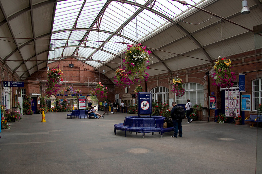 Concourse, Bridlington station 
 Whilst the station in Bridlington opened in 1846 the delightful covered concourse was not constructed until the station was expanded in 1912. A real effort has been made to make the station a welcoming place and shows what can be done when people care about their local resources. Whilst the rooms on either side of the concourse are no longer in railway use local interest groups such as charities and an arts group make full use of them. 
 Keywords: Concourse Bridlington station