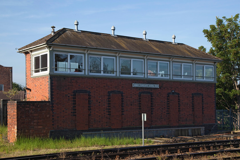 Abbey Foregate signal box (GWR, 1914) 
 Shrewsbury's Abbey Foregate signal box is a GWR Type 7D structure that opened in 1914. Whilst it's a large box, the number of levers in use today is a fraction of what it once was. It is difficult to get access for a picture. This one was taken using my long ladder over a wall in a cul-de-sac opposite the railway. 
 Keywords: Abbey Foregate signal box