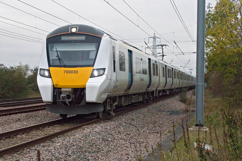 700030, TL 07.54 Peterborough-Horsham (9J15, 3L), Tempsford level crossing 
 The Class 700 Desiro City units entered service in December 2016 (where has all that time gone?) and are now a familiar and reliable train seen operating between Peterborough/Bedford, through London to Brighton. The 9J15 07.54 Peterborough to Horsham service passes Tempsford level crossing on the up slow line. 
 Keywords: 700030 07.54 Peterborough-Horsham 9J15 Tempsford level crossing Thameslink Desiro City