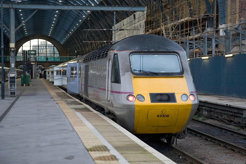 43308, GR 17.33 London King's Cross-Harrogate (1D24), London KIng's Cross station 
 With work continuing at King's Cross station, a process that seems pretty continuous of late, 43308 rests at the rear of an up HST service. With the passengers having disembarked earlier the train is sitting being prepared to work the 1D24 17.33 King's Cross to Harrogate that runs clockwise from Leeds to its destination. 
 Keywords: 43308 17.33 London King's Cross-Harrogate 1D24 London KIng's Cross East Coast HST