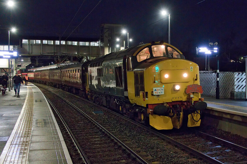 37403, outward leg of 'The Wolf Hall Thunderer', 05.25 Derby-London St. Pancras (1Z40, 10L), Kettering station 
 At just past 06.30 The Wolf Hall Thunderer charter arrived at Kettering station which aroused the interest of a few and hardy local enthusiasts. Whilst this hour was a little anti-social not as much as those who picked the train up at its start point, Derby, where it left at 05.25! I must admit to being a little disappointed when the train rolled in hoping that 50008 'Thunderer' would be leading. However, 37403 'Isle of Mull' in its retro. ScotRail large logo livery is pretty good by anybody's standards! 
 Keywords: 37403 The Wolf Hall Thunderer 05.25 Derby-London St. Pancras 1Z40 Kettering station Isle of Mull Large Logo