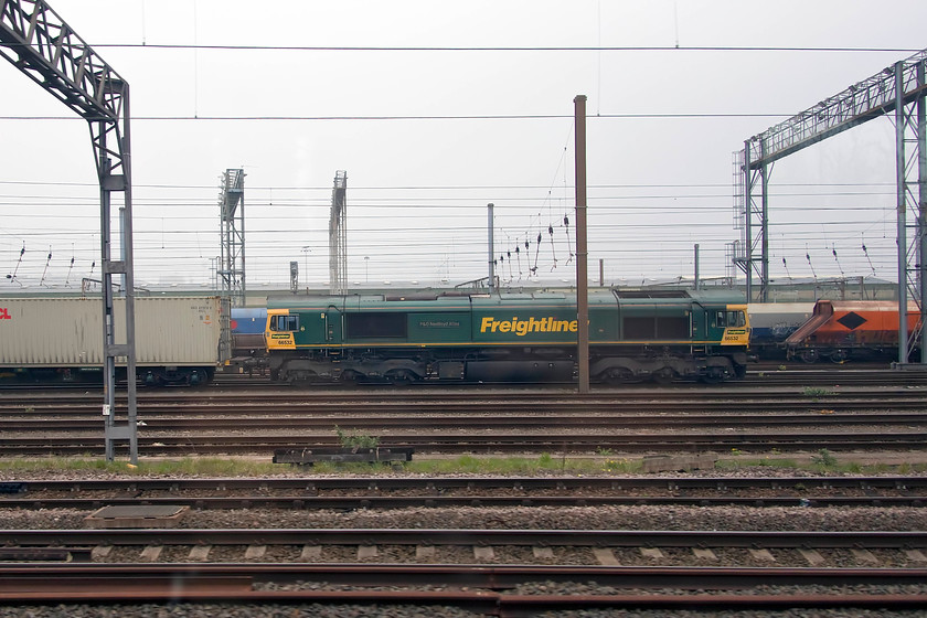 66532, unidentified up Freightliner, Wembley yard 
 66532 'P&O Nedlloyd Atlas' sits at the head of an unidentified Freightliner in Wembley yard. This is one of my most photographed class 66s that I have many images of at various locations. 
 Keywords: 66532 up Freightliner Wembley yard