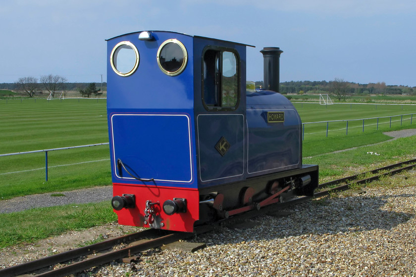 Howard, running round, Wells-next-the-Sea station 
 Having arrived from Pinewoods Hills one of the two resident locomotives of the Wells Harbour Railway 'Howard' runs round the stock at the railway's Harbour station. 
 Keywords: Howard running round Wells-next-the-Sea station