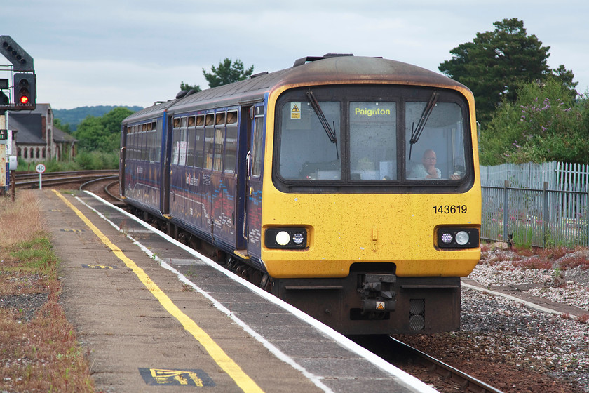 143619, GW 13.23 Exmouth-Paignton (2T17, 3E), Newton Abbot station 
 The 13.23 Exmouth to Paignton working drifts into Newton Abbot's platform three formed of 142619. In a bizarre way, I will miss these little units when they are withdrawn by 2020 due to their failure to meet the Rail Vehicle Accessibility Regulations, I am not sure that the hapless customers who are forced to use them every day will feel the same! 
 Keywords: 143619 2T17 Newton Abbot station