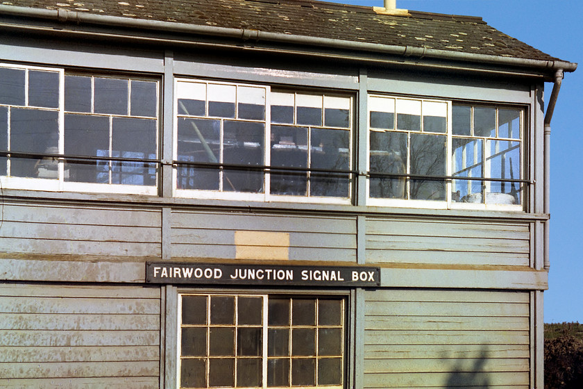 Fairwood Junction Signal Box (GW, 1933) 
 The fact that I am so close to the front of Fairwood Junction signal box perhaps indicates that it was not staffed and switched out early on this Sunday morning, either that or there was a friendly signalman on duty. This image shows the timber work of this 28 lever GW Type 28B box that opened on 1st January 1933 and its lovely cast plate. 
 Keywords: Fairwood Junction Signal Box