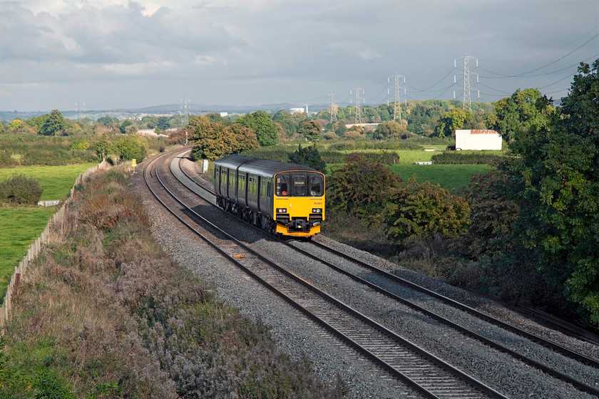 150101, GW 12.51 Great Malvern-Weymouth (2090), Berkley ST808497 
 With some nasty looking cloud building from the south, 150101 passes Berkley working the 12.51 Great Malvern to Weymouth. In about a mile's time, the unit will diverge from the mainline at Clink Road Junction in order to take in the single section of track and make its stop at Frome. Soon after this brief stop, it will re-join the mainline again at Blatchbridge Junction. 
 Keywords: 150101 12.51 Great Malvern-Weymouth 2090 Berkley ST808497