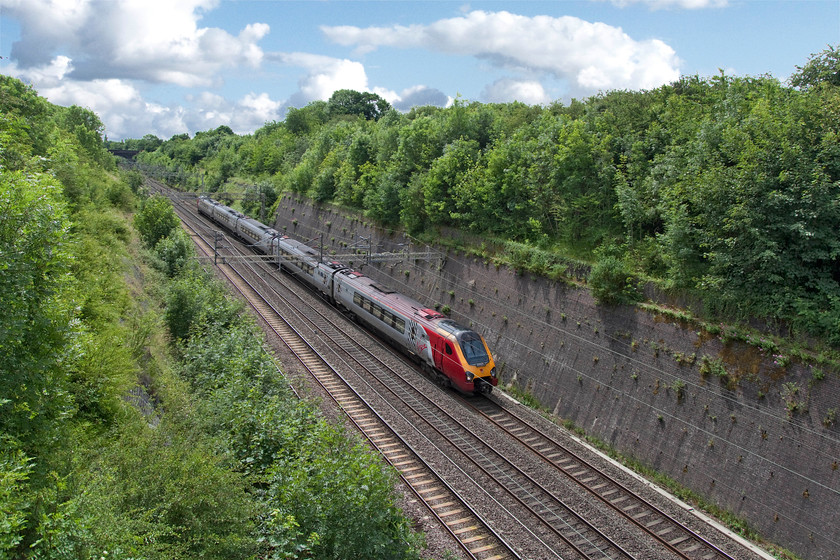 Class 221, VT 11.10 London Euston-Chester (1D85, 1L), Roade Cutting 
 An unidentified class 221 works the 11.10 London Euston to Chester through the grandeur that is Roade Cutting. This picture makes you realise the shear size of this engineering project that was completed by the London and Birmingham Railway in 1838 
 Keywords: Class 221 1D85 Roade Cutting