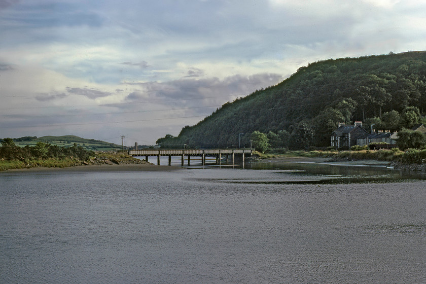 Former Geenodd viaduct (Furness Railway, 1857) from A590 
 The former railway viaduct at Geenodd is seen in the evening light. The viaduct crosses the estuary of the River Leven at its narrowest point before entering Morcombe Bay. The vaiduct carried the closed Plumpton Junction to Windermere Lakeside branch. The northern end of this lin is the home to the present day Lakeside and Haverthwaite Railway. The railway viaduct was demolished and replaced by a concrete structure that carries a footpath and a section of the National Cycle Route 70. 
 Keywords: Former Geenodd viaduct Furness Railway 1857 from A590