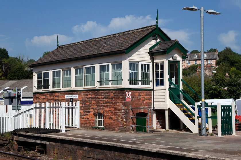 Lostwithiel Crossing signal box (GW, 1893) 
 Lostwithiel Crossing signal box looks absolutely stunning in the afternoon summer sun. Despite it having had some sympathetic modernisation it still retains much of it original looks. It still has its shallow-pitched roof with barge-boards and spear-point finials to the gable ends. Lostwithiel box is thought to be the earliest surviving Great Western type 5 box on the network dating from 1893. Along with a number of other boxes in Cornwall, it is grade II listed so a future is secure after closure. 
 Keywords: Lostwithiel Crossing signal box