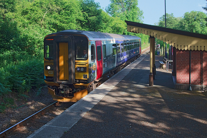 153333, GW 17.15 Looe-Liskeard (2L90, RT), St 
 The delightfully named St. Keyne Wishing Well Halt is a tiny station on the scenic Looe branch, the second station out from Liskeard. It is one of only two stations in the country that Network Rail designate as a halt, the other one being the next station , Coombe Halt. In this picture, 153333 has been requested to stop by a passenger wishing to alight as it works the 17.17 Looe to Liskeard The next station is the afore mentioned Coombe where it will reverse and climb the steeply graded section to Liskeard to complete its journey. 
 Keywords: 153333 2L90 St. Keyne Wishing Well Halt