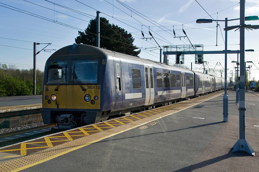 360113, 07.58 Harwich Town-London Liverpool Street (1A27), Manningtree station 
 360113 arrives at Manningtree station working the 07.58 Harwich to Liverpool Street 1A27 service. Take away the front of these units and they are, for intent and purpose, exactly the same as the Class 350 Desiros that operate past my home day in day out on the WCML. The fronts of the 360s have no interconnecting doors that must make the cab a more pleasant working environment from the more cramped version in the 350s. 
 Keywords: 360113 07.58 Harwich Town-London Liverpool Street 1A27 Manningtree station Abellio Greater Anglia Desiro