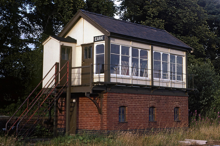 Cark signal box (BR, 1952) 
 The former Cark signal box pictured in some welcome evening sun at the end of what had been an ostensibly very dull day. The box was switched out as it spent a fair bit of its short working life. It was built by British Railways in 1952 and I believe that it was removed in April 2006, can anybody confirm this? I have a precious amount of information on this box, can anybody supply any further information? 
 Keywords: Cark signal box (BR, 1952)