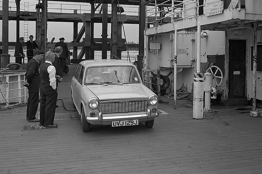 UVJ 129J, boarding MV Farringford, 16.50 New Holland-Hull Corporation Pier, New Holland Pier 
 Graham eases UVJ 129J on to the deck of MV Farringford ready for the 16.50 sailing from New Holland Pier to Hull Corporation Pier. Notice the crew members smartly attired in their Sealink uniforms going about their business of supervising loading. All were to lose their jobs the following week when the ferry was to cease operations with the opening of the Humber bridge. I am sure that this was fine for the motorists of north Lincolnshire but for the foot passengers and those who arrived by train on to the pier head, it would be a different story with them being inconvenienced with the new crossing over the river via the bridge being some considerable distance upstream near to Barton-on-Humber. 
 Keywords: UVJ 129J boarding MV Farringford 16.50 New Holland-Hull Corporation Pier New Holland Pier Sealink