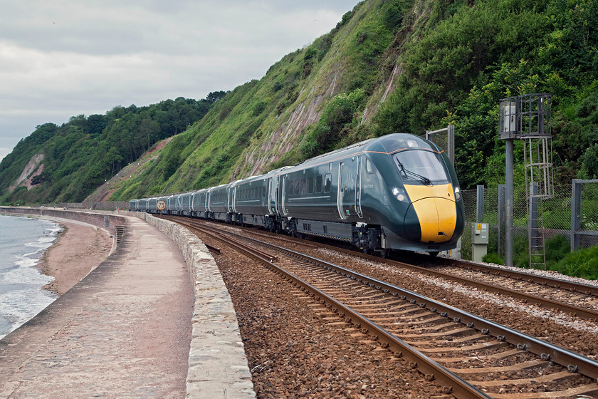 800003 & 800004, 12.47 Penzance-North Pole IEP Depot test run (5X92), Parsons Tunnel 
 A first recorded on the sea wall at Parsons Tunnel. Earlier in the day, the combination of 800003 'Queen Elizabeth II/Queen Victoria' and 800004 'Isambard Kingdom Brunel/Sir Daniel Gooch' worked the first test train into Devon and Cornwall. Here, as the 12.47 Penzance to North Pole return working is seen heading back to London. It has to questioned if these IETs are going to be as good as the HSTs on the Devon and Cornwall banks. On paper, there is a distinct power deficit on their part. This picture featured in Rail magazine. Thirty-eight years previously, I visited this spot, then the subject matter was somewhat different but everything else was virtually the same..... https://www.ontheupfast.com/v/photos/21936chg/26669846004/x50012-09-50-penzance-london-paddington 
 Keywords: 800003 800004 12.47 Penzance-North Pole IEP Depot test run 5X92 Parsons Tunnel