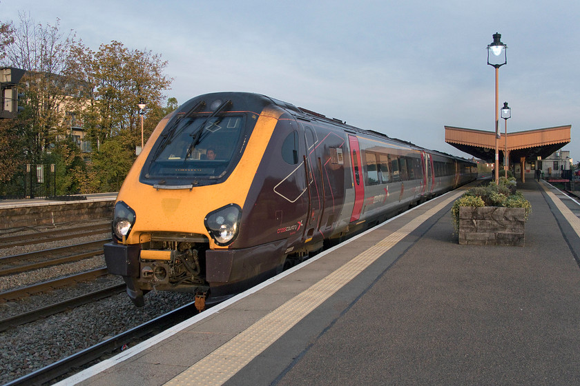 220009, XC 13.47 Southampton-Edinburgh Waverley (1S52, 11L), Leamington Spa station 
 With the station lights now illuminated and the sun is doing its best to give a little additional very late additional light at Leamington Spa it must be getting late. 220009 accelerates rapidly away from the station with the 13.47 Southampton Central to Edinburgh Waverley. This 1S52 Crosscountry service traverses the length of England from the south coast to the Scottish capital, a journey of four hundred and sixty-eight miles, and should arrive at 21.30, on this day it was some eleven minutes late. 
 Keywords: 220009 13.47 Southampton-Edinburgh Waverley 1S52 Leamington Spa station