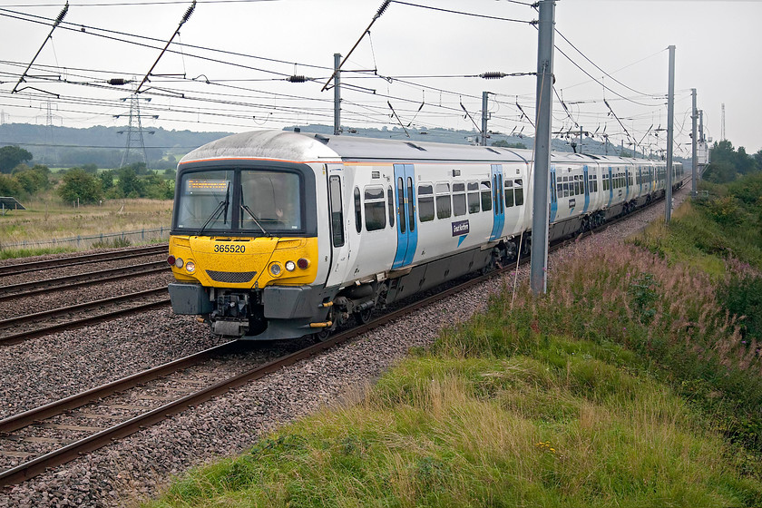 365520, GN 10.22 London Kings Cross-Peterborough (1P48, 1L), Sandy TL176510 
 365520 leads one of its classmates south on the down slow line past New Zealand bridge north of Sandy. The train is working the 10.22 London King's Cross to Peterborough local stopper. 
 Keywords: 365520 1P48 Sandy TL176510