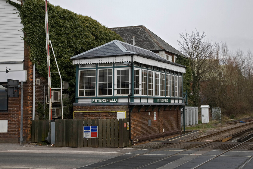 Petersfield signal box (LSW, 1880s) 
 A superb survival from the Victorian age still doing what it was designed and built to do! Petersfield signal box dates from around 1880 and looks to be in good condition. An unusual feature is the fretted timber valance and at the other end of the box it still retains its timber steps leading to a small landing. There are talks that it will become rade II listed that if so will secure its future after resignalling renders it redundant in the next few years. 
 Keywords: Petersfield signal box LSW 1880