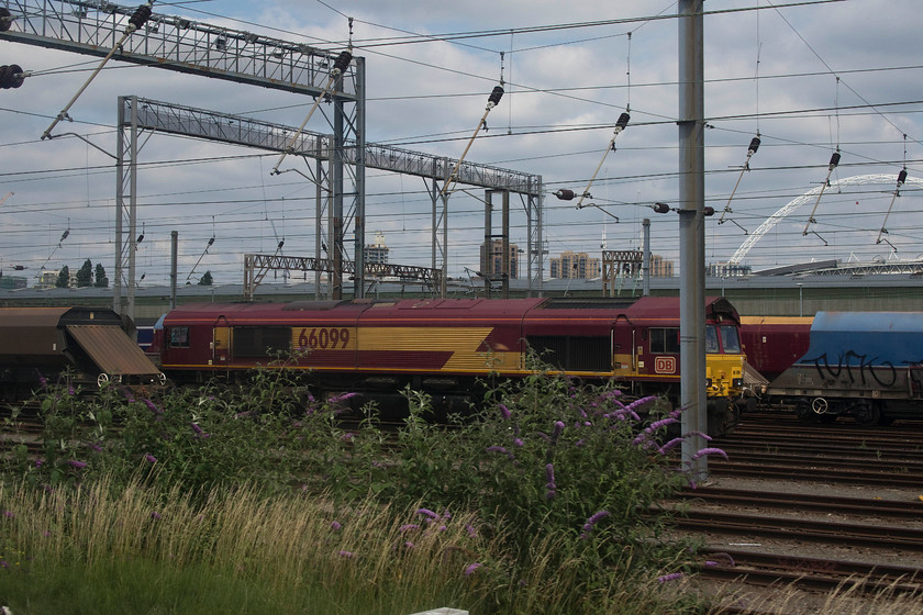 66099, stabled, Wembley yard 
 Not a great picture of 66099 stabled in Wembley yard but it was a 'photo-cop' for me! 66099 arrived in the country in April 1999 making it over twenty years old now. 
 Keywords: 66099 stabled Wembley yard