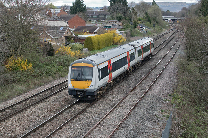 170272, AW 16.46 Cheltenham-Maesteg (2L65, RT), Cloddy bridge 
 One of the operating extremities of Transport for Wales/Trafnidiaeth Cymru's network is Cheltenham with return services between there and Maesteg via Cardiff thus offering the travelling public an alternative to using CrossCountry. However, TfW still uses the same units as XC in the form of Class 170s but the former's examples have undergone a refresh following their acquisition from Greater Anglia. 170272 gets away from Cheltenham past Cloddy bridge working the 2L65 16.26 Cheltenham to Maesteg service. 
 Keywords: 170272 16.46 Cheltenham-Maesteg 2L65 Cloddy bridge