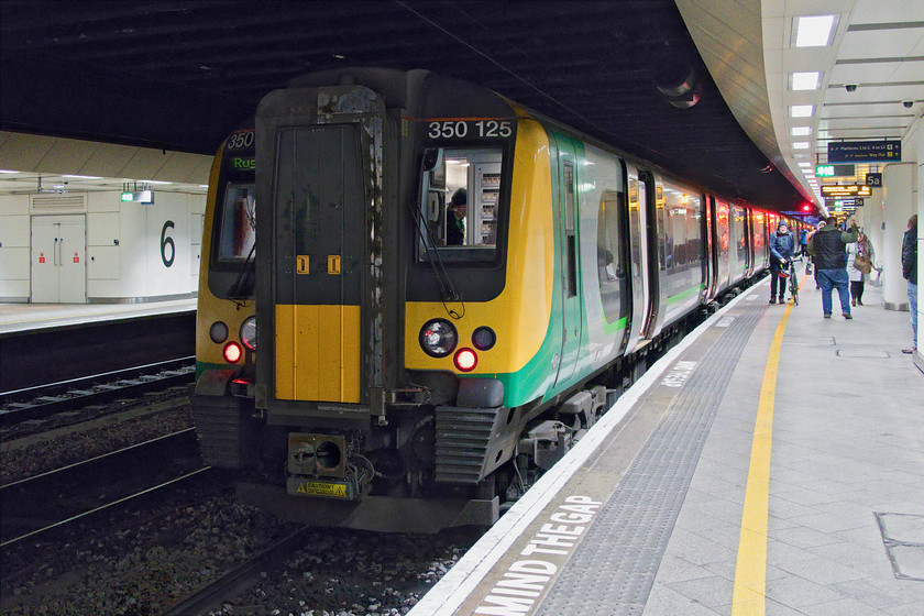 350125, LN 06.05 Northampton-Crewe & Rugeley Trent Valley (9K10, 2L), Birmingham New Street station 
 Having arrived at Birmingham New Street, 350125 is about to be split from another Desiro as the 06.05 Northampton to Crewe and Rugeley Trent Valley. Mike and I had travelled on this 9K10 service from Northampton with the first vestiges of daylight seen as we entered Birmingham. 
 Keywords: 350125 06.05 Northampton-Crewe Rugeley Trent Valley 9K10 Birmingham New Street station