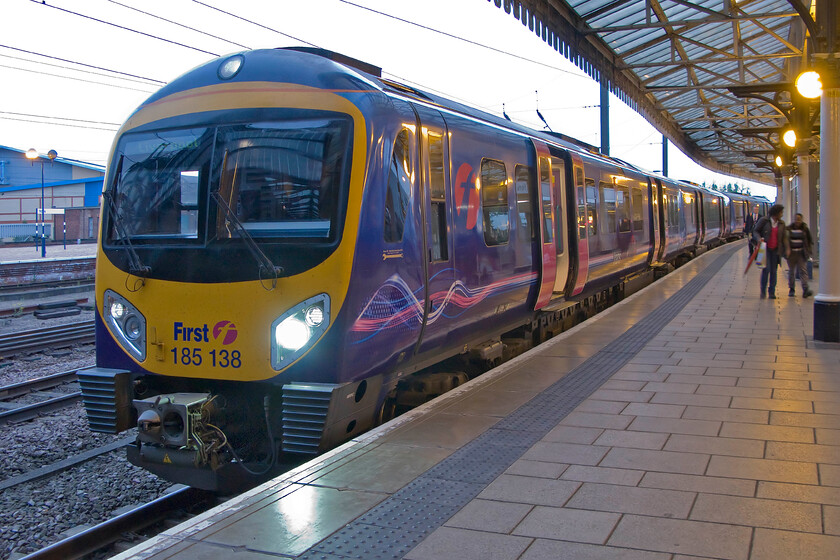 185138, TP 19.50 Scarborough-Liverpool Lime Street (1F85), York station 
 By the time my wife, son and I returned from Malton to York aboard the 19.50 Scarborough to Liverpool service it was getting dark. TransPennine Express' 185138 is seen waiting at York to continue its journey westawrds. 
 Keywords: 185138 19.50 Scarborough-Liverpool Lime Street 1F85 York station