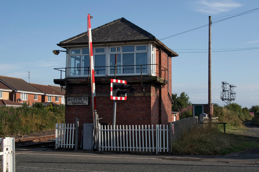 Marchey`s House signal box (NE, 1895) 
 Apart from having replacement windows, the delightfully named Marchey's House signal box remained largely un-molested. It still retains its wooden nameboard balcony, not that I think any signalman would actually trust it! The box, that is actually located in the village of Stakeford, that controls the line between North Seaton and Bedlington North signal box, as well as the spur to Winning Signal Box. 
 Keywords: Marchey`s House signal box